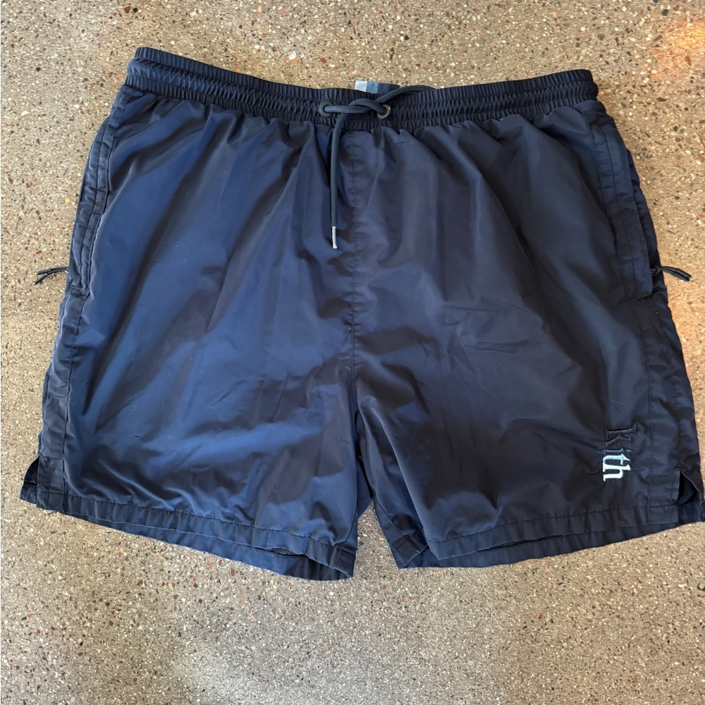 KITH swimshorts navy blue.